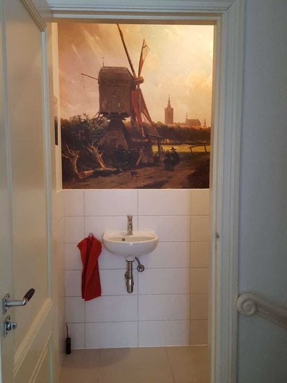 Fotobehang - Gezicht op Den Haag vanaf de Delftse vaart in de zeventiende eeuw