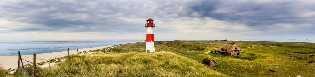 Fotobehang - Vuurtoren in de duinen